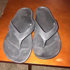 Crocs black flip flops size 9